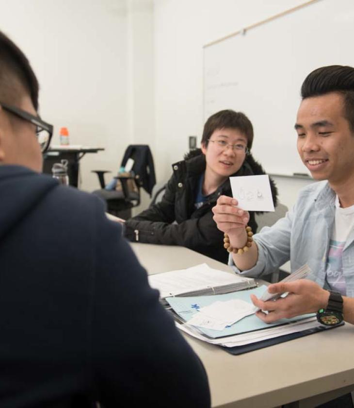 Chinese students with English flashcards