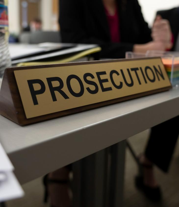 mock trial table sign