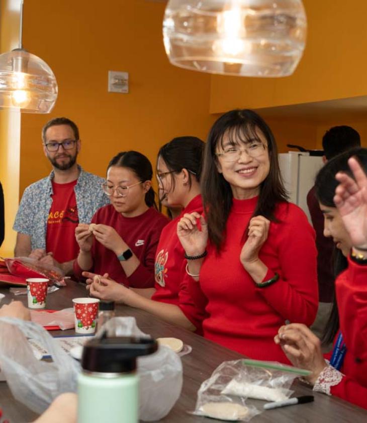 Group of international students eating a meal