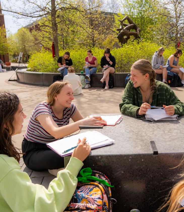 students having math class outside in spring 