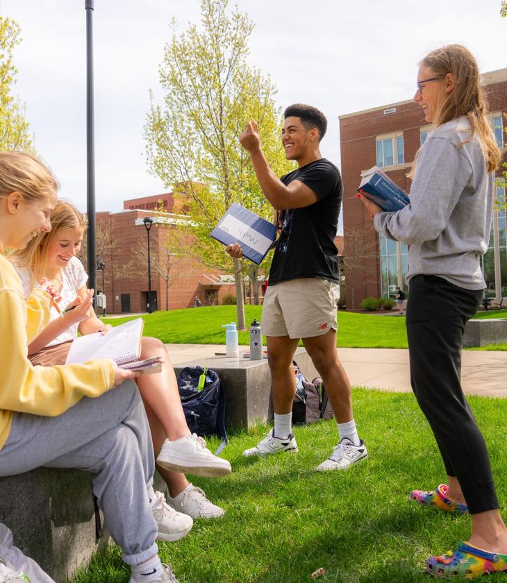 students outdoors for math class, laughing