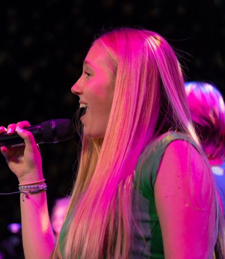Close up of a student singing during A Capella Extravaganza