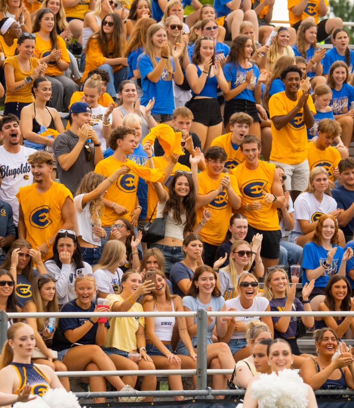 A large group of students wearing Blue and Gold cheer on the Blugold Football Team during the first home game of the 2026 seasons.