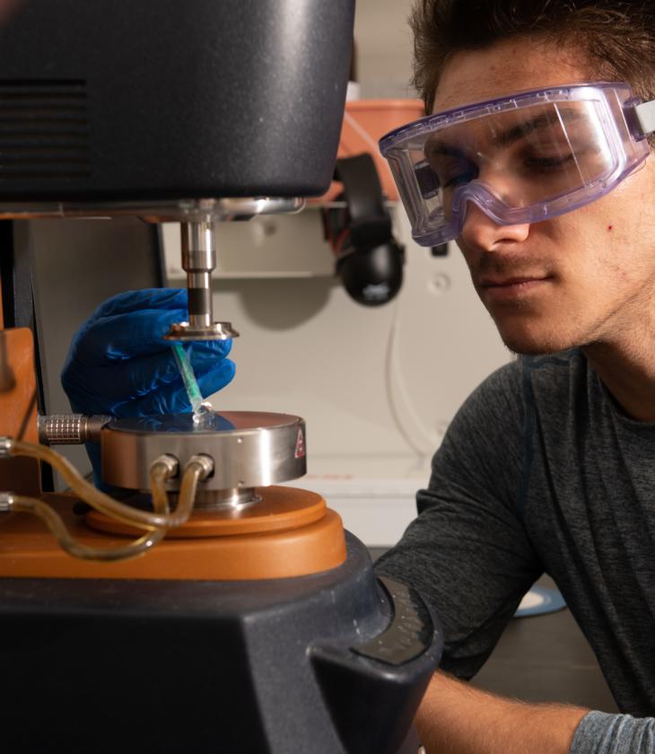 Materials science student working in a lab