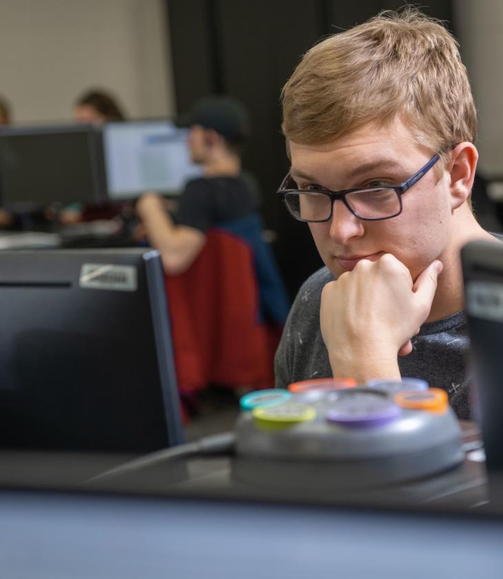 Student analyzing computer
