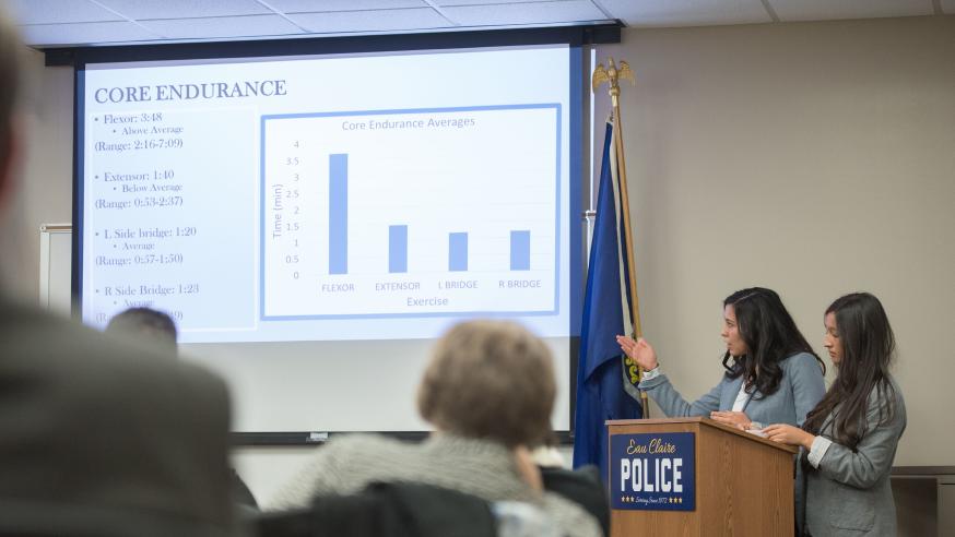 KINS students presenting vest research to police