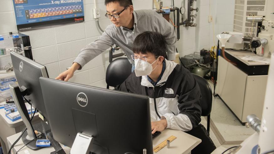 Dr. Ying Ma and research student in computer lab
