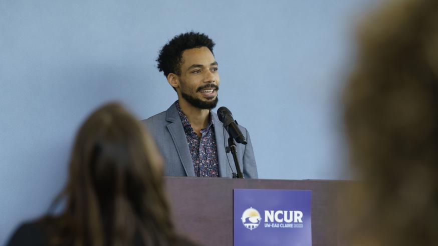 Tayo Sanders speaking at NCUR 2023