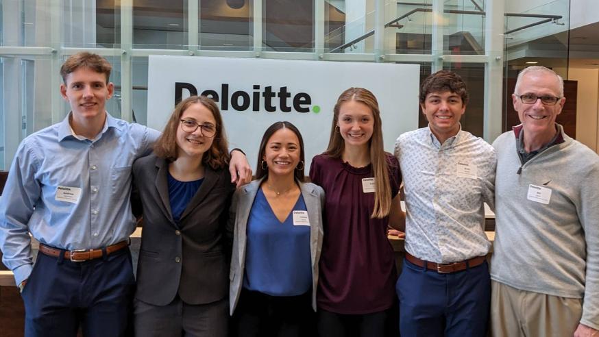 team of accounting students in group shot with a faculty member 