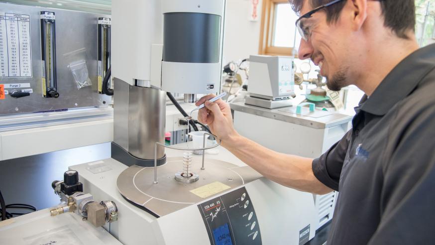 Student in MatSci using lab instrumentation