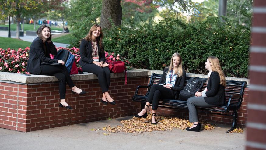 female sales team outside Schneider Hall 
