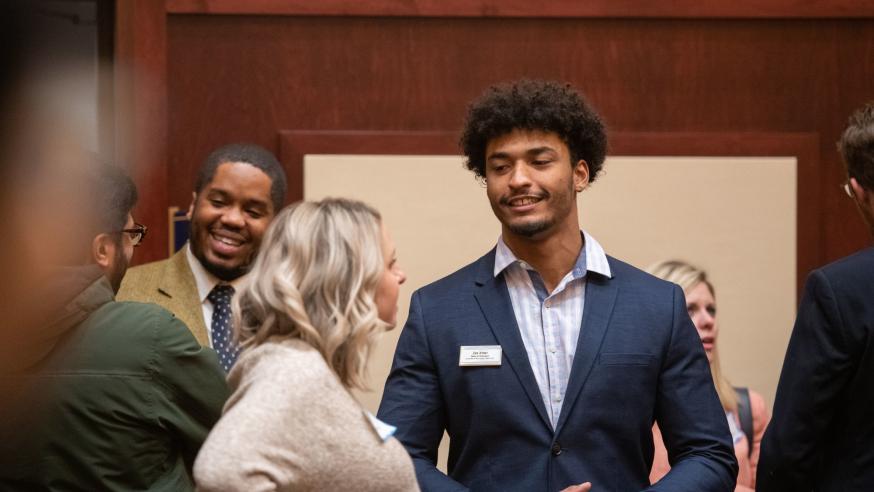 career fair students chatting with  business reps