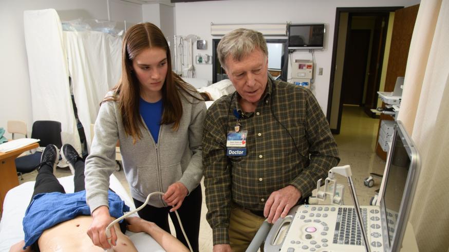 Mayo doctor with nursing student in Sim Lab