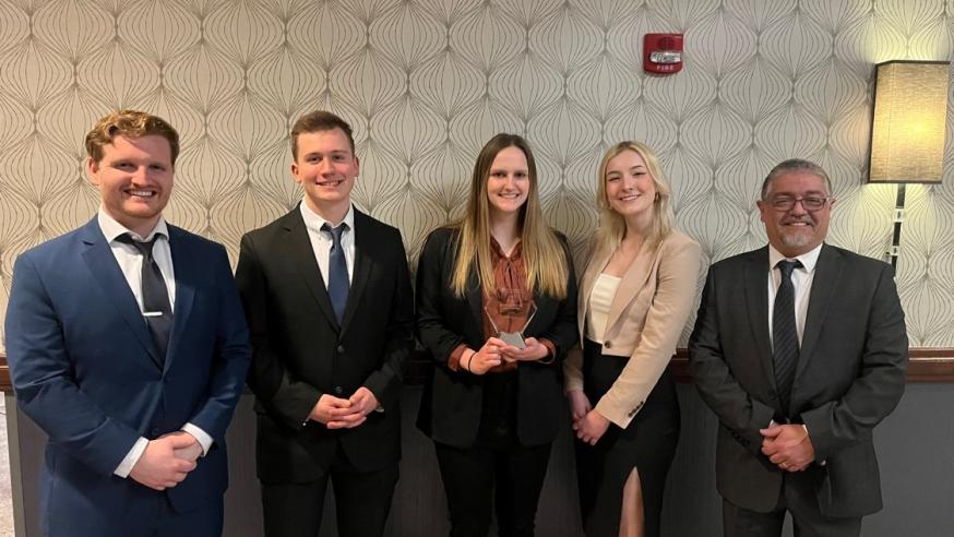 Students and faculty at finance group competition