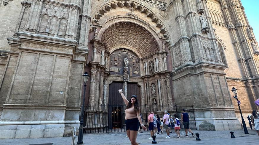 female student in front of a cathedral in Spain