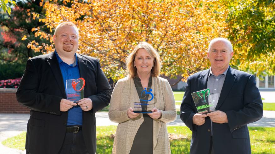 Paula Lentz, business communications faculty, Tim Vaughan and Dave Nesvacil