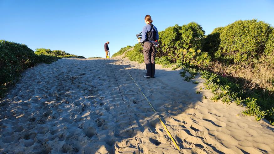 students using GEOG tech in sand dunes