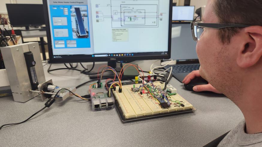 A student using physics LabView software