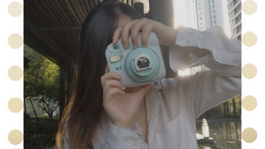 Chinese Student pointing camera toward you
