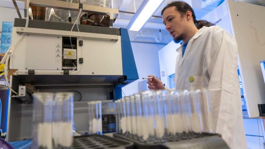 Chemistry Reserach Student Running Samples