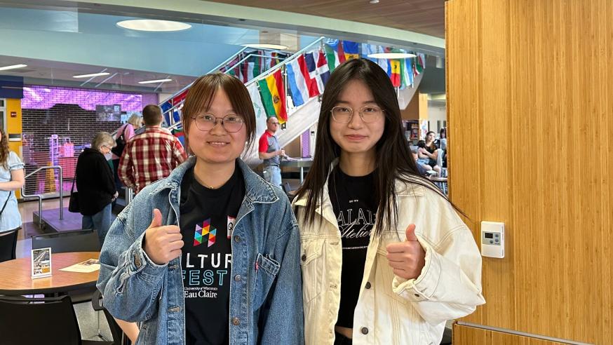 Two Buddy Program students exploring the UWEC CultureFest together.