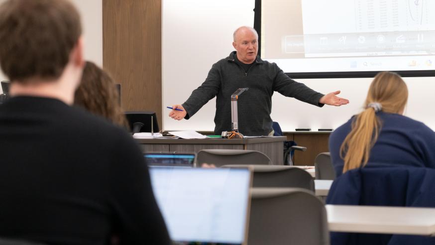 Supply Chain professor, Tim Vaughan, teaching students in Managerial Decision Modeling and Analysis course. 