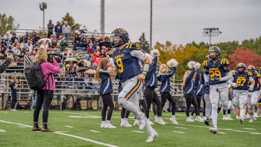 football players on field during game