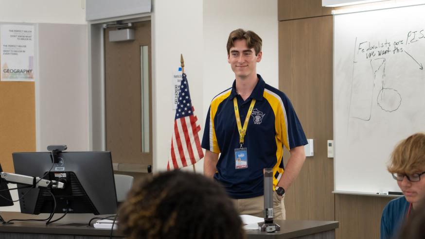 Badger Boys State staffer addressing a group of students 