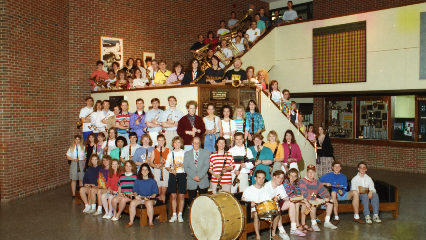 1992 Symphony Band posing in the Haas Lobby