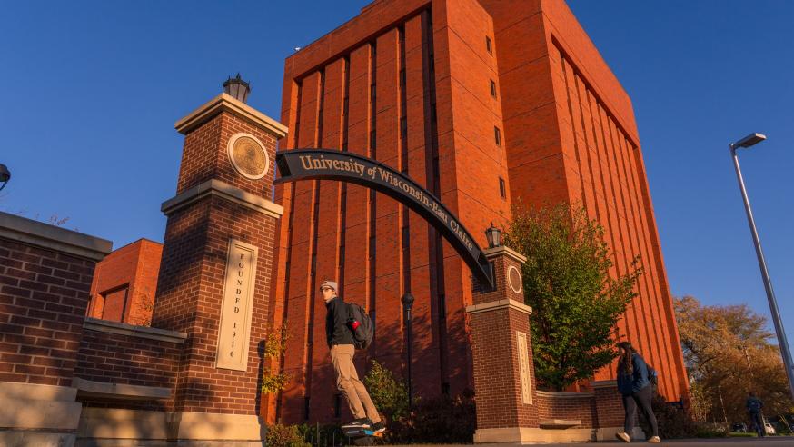 archway morning light, fall, one wheel rider under the arch