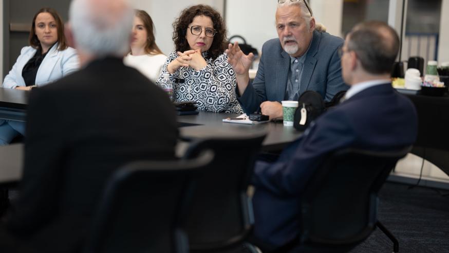 Polish delegation meeting, group seated 