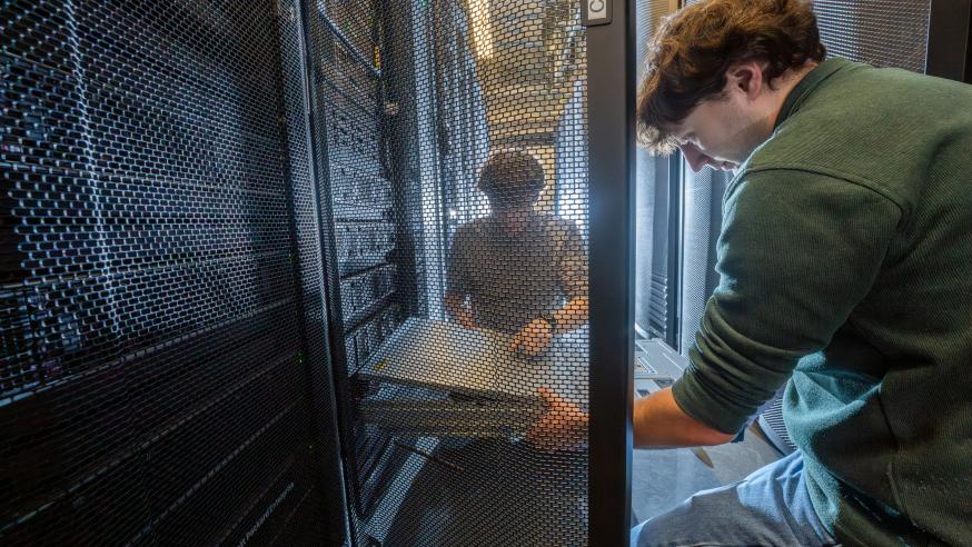 Will Jerome, left, and Tyler Bauer work on a server associated with the Blugold Center for High Performance Computing on January 9, 2026