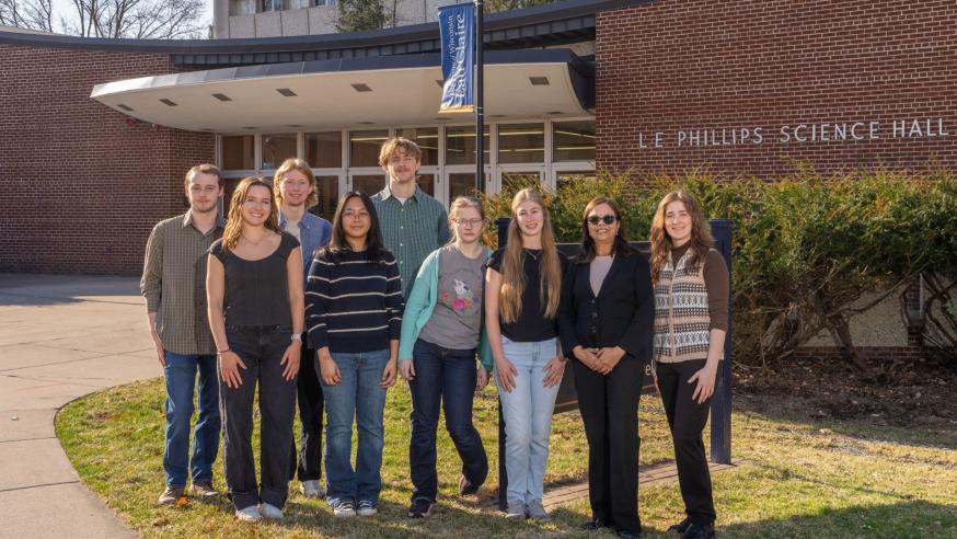 Dr. Hati with mentor students outside Phillips Hall 033026