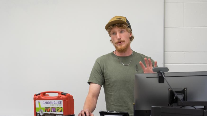 An Integrated Studies student presents to a classroom. 