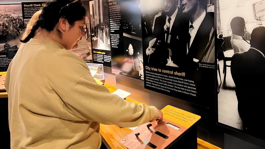 students in a cultural center museum about Emmet Till