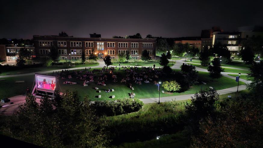 late night event from AUC, movie night on campus mall, viewers spread across campus mall, image from rooftop