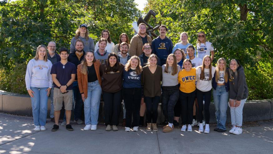 Group of CJ 251 students lined up and smiling at the camera.