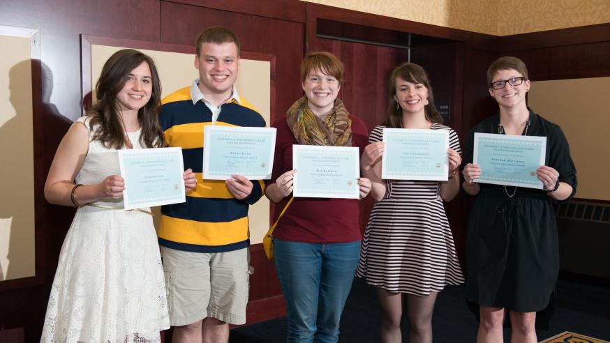 UWEC students posing with scholarships UWEC students posing with scholarships