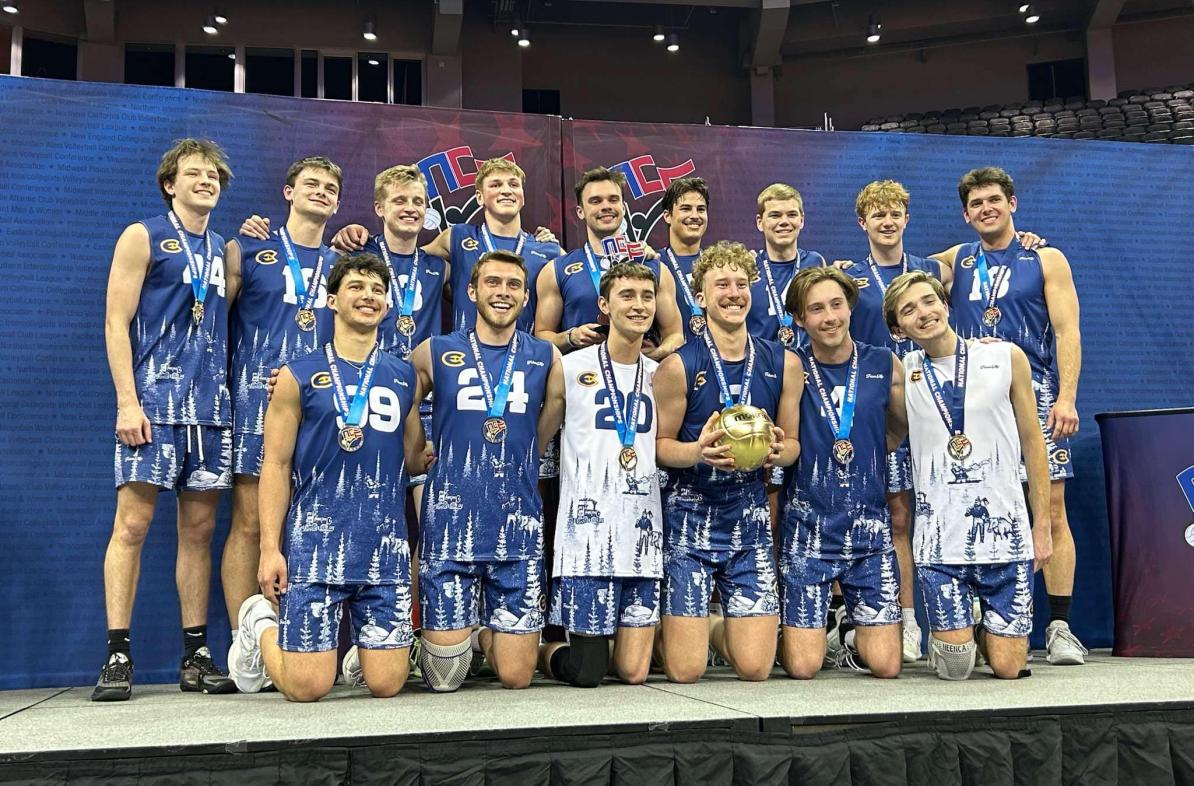 men's club volleyball with trophy