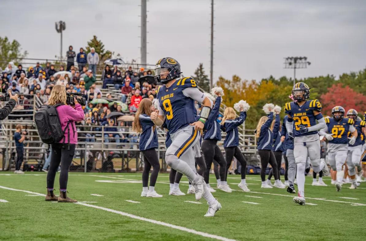 football players on field during game