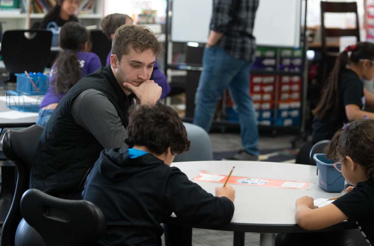 UW-Eau Claire student working in a school