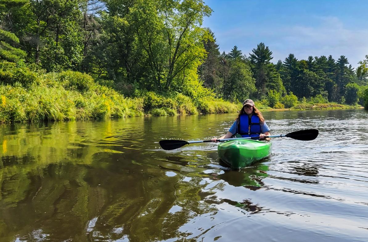 Lyndsie Vickers in kayak on Eau Claire river 