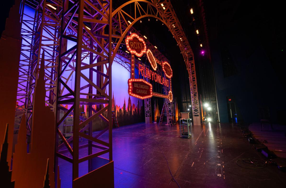 empty stage of Guys and Dolls set in place
