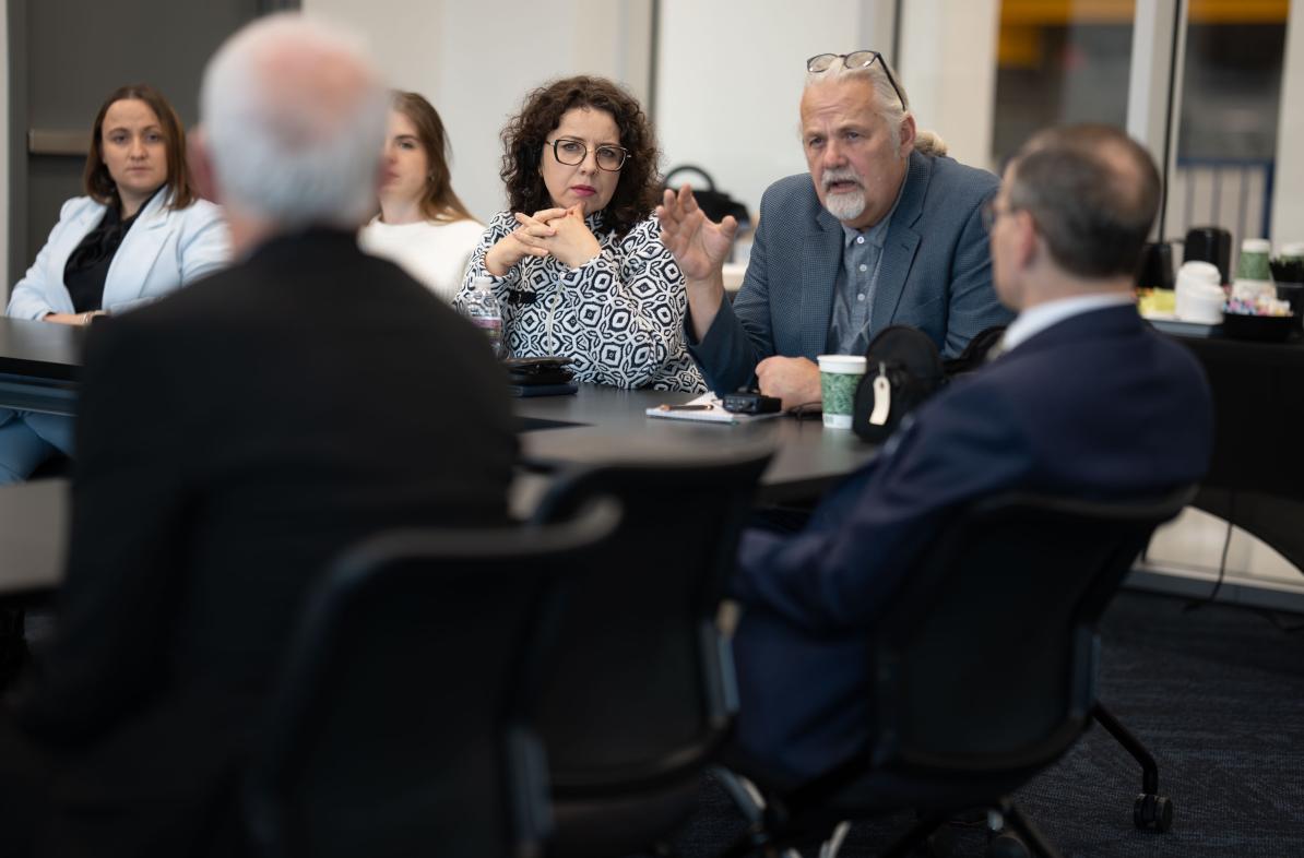Polish delegation meeting, group seated 