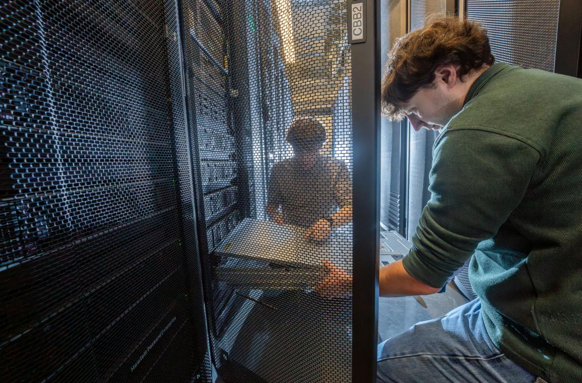 Will Jerome, left, and Tyler Bauer work on a server associated with the Blugold Center for High Performance Computing on January 9, 2026