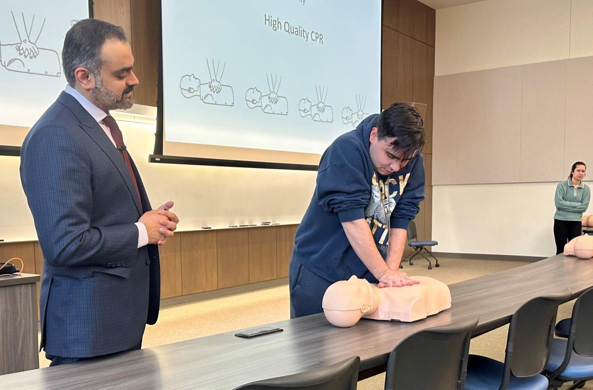 Student learning CPR in Medical Academy session 