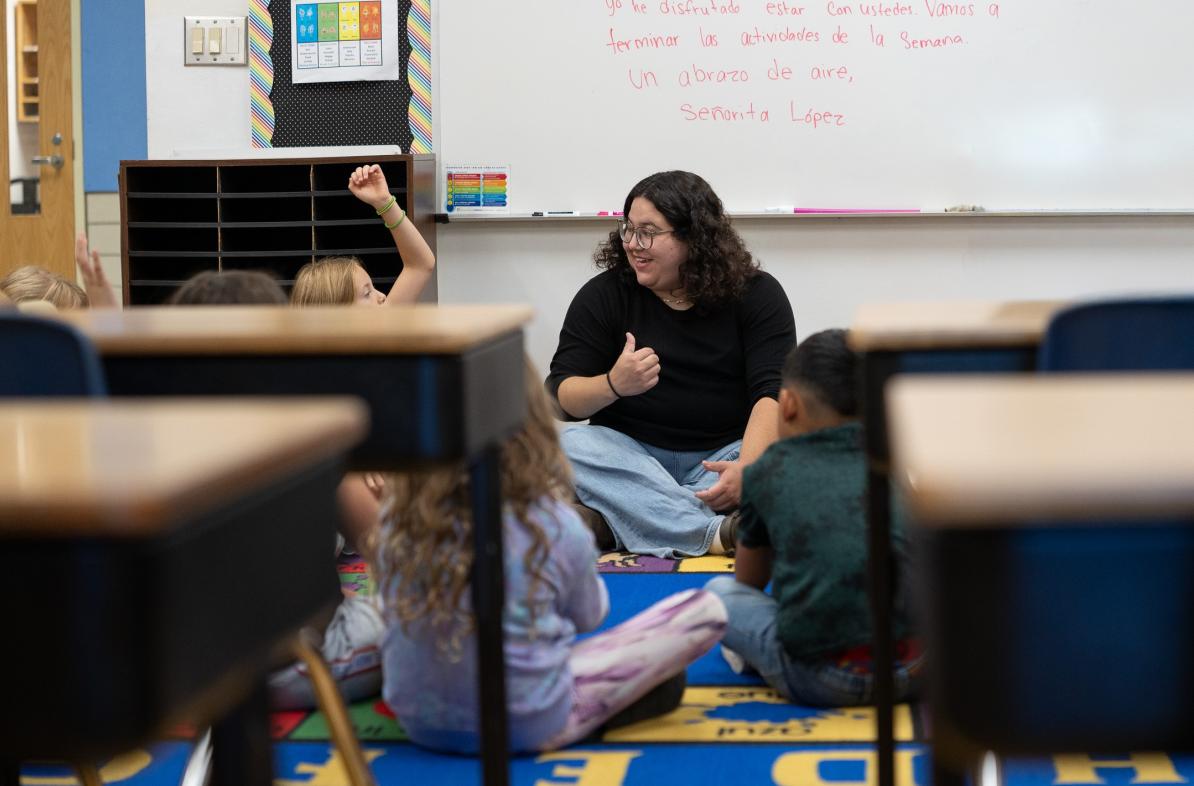 student teacher in elementary classroom 