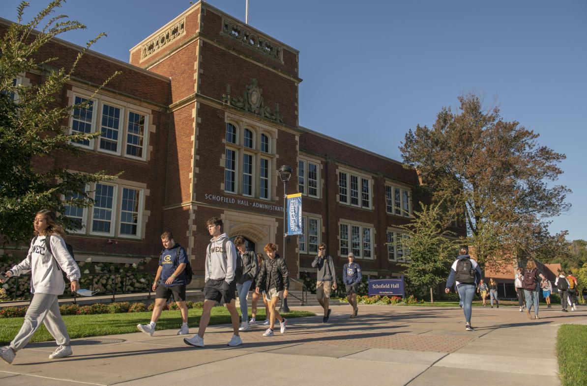 Campus mall with Schofield Hall in fall