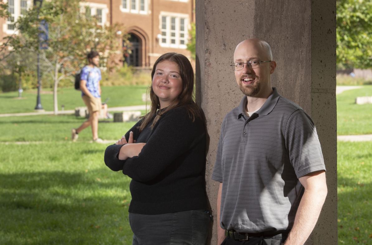 Dr. Eric Kasper teaches political science at UW-Eau Claire, his alma mater. This fall, his daughter, Maddie, joined him on campus and began working toward her own degree in political science. (Photo by Bill Hoepner)