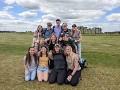 Student group posing at Stonehenge